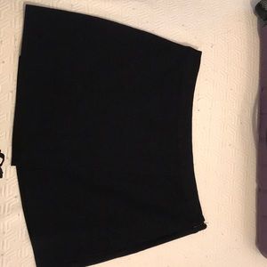 Black skirt with a asymmetrical over Peice